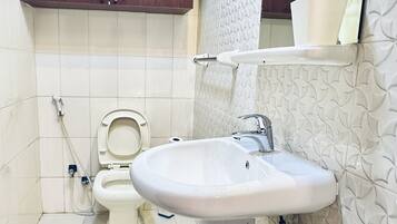 Hair dryer, towels, soap, toilet paper