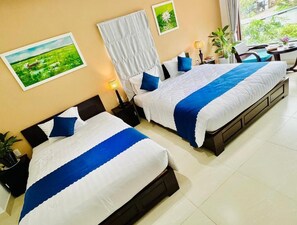 Family Room, City View | Desk, laptop workspace, soundproofing, free WiFi