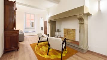 Comfort Apartment | Living area | 40-inch flat-screen TV with digital channels