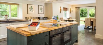 Monnington House & Cottages Sleep 24 in 12 bedrooms & 12 bathrooms and dines 24