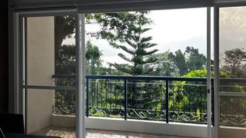 Family Villa | Living area | Flat-screen TV