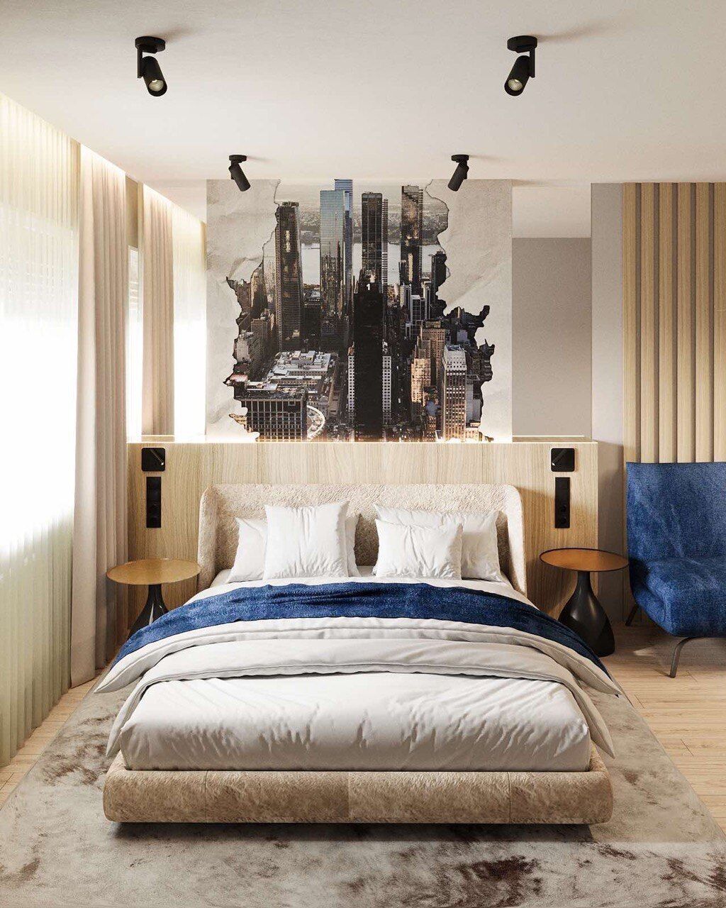 A modern bedroom with a large bed, a cityscape artwork on the wall, and a blue chair.