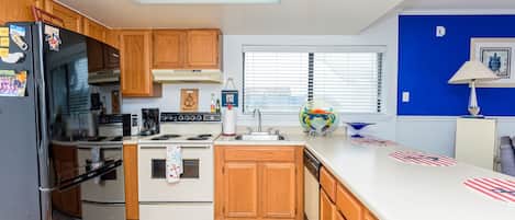 Fridge, microwave, dishwasher, coffee/tea maker