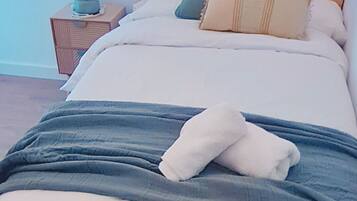 3 dormitorios, tabla de planchar con plancha, wifi gratis y ropa de cama