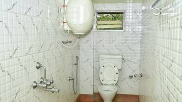 Shower, rainfall showerhead, towels, soap