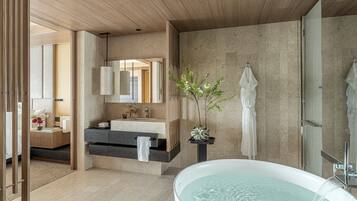 Designer toiletries, hair dryer, bathrobes, slippers