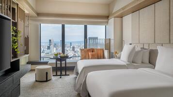 Premium bedding, down duvets, pillow-top beds, minibar