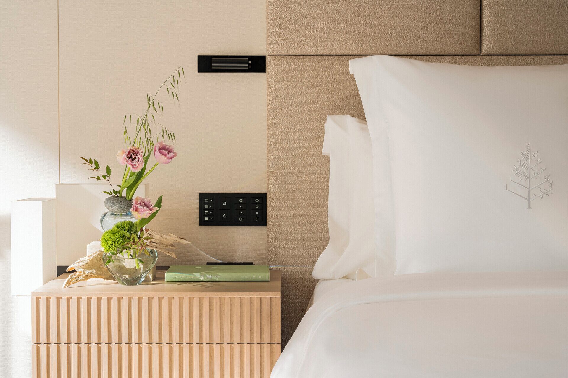 Premium bedding, down comforters, pillowtop beds, minibar