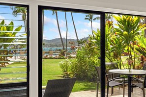 Outdoor dining - Lae Nani 212, AC, Ocean View, Tropical Oasis, Steps to Beach and Town (Kapaa)