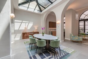 Luxury Apartment | Living area | 40-inch flat-screen TV with cable channels - Duomo Penthouse By Geco Vacation Rentals (Florence)