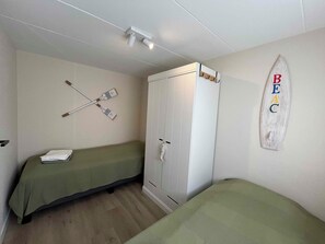 4 habitaciones, caja de seguridad en la habitación y cuna de viaje