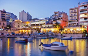 Stunning waterfront views and a lively marina await at DOLCE VITA.