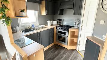 Apartemen | Dapur pribadi | Lemari es, microwave, oven, dan kompor