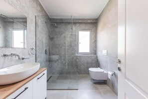 Hair dryer, bidet, towels, soap