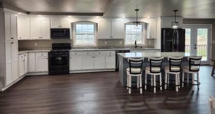 Cozy home located on 10 acres with a pond for fishing and kayaking.