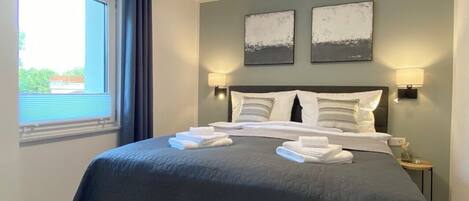 1 غرفة نوم ومكواة/لوح كي وواي فاي وملاءات أسرّة