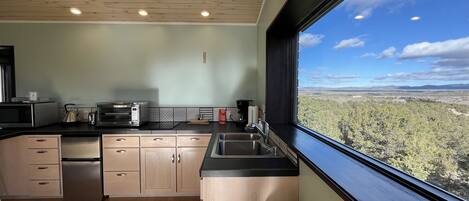 Fridge, microwave, stovetop, coffee/tea maker