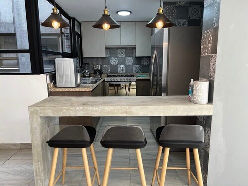 Elegant Condo with Private Terrace, Masaryk Nearby