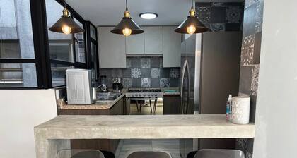 Elegant Condo with Private Terrace, Masaryk Nearby