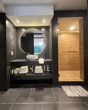 Shower, hair dryer, towels