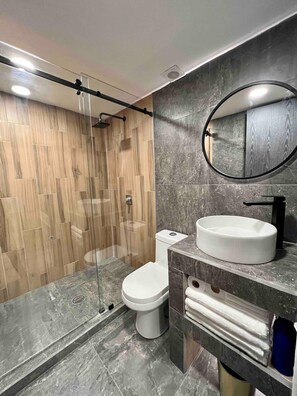 Shower, hair dryer, towels, soap