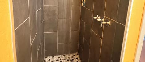 Shower, towels, soap, shampoo