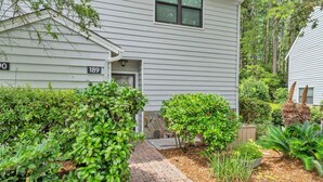 A two-story house with the number 50 on the front. - Cassine Gardens 189 (Santa Rosa Beach)