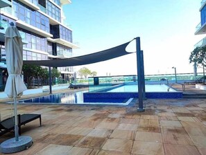 Relax by the pool with a lounge chair and enjoy a game of pool.