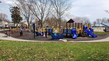 A playground with slides and climbing structures.