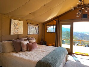 1 bedroom, desk, iron/ironing board, travel crib