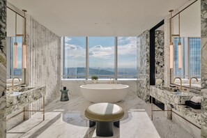 Premium bedding, down duvets, Select Comfort beds, in-room safe