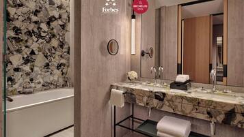 Separate tub and shower, rainfall showerhead, hair dryer, bathrobes