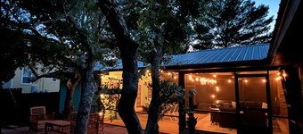 Enjoy art and relaxation in this hilltop home