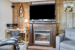 TV, fireplace, books, offices