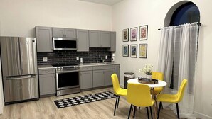 Coffee/tea maker, fridge, microwave, oven - Uptown Luxury Studio On The Square Downtown Bloomington (Bloomington)