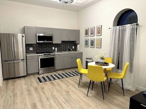 Coffee/tea maker, fridge, microwave, oven