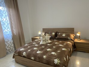 2 habitaciones, tabla de planchar con plancha, wifi y ropa de cama 