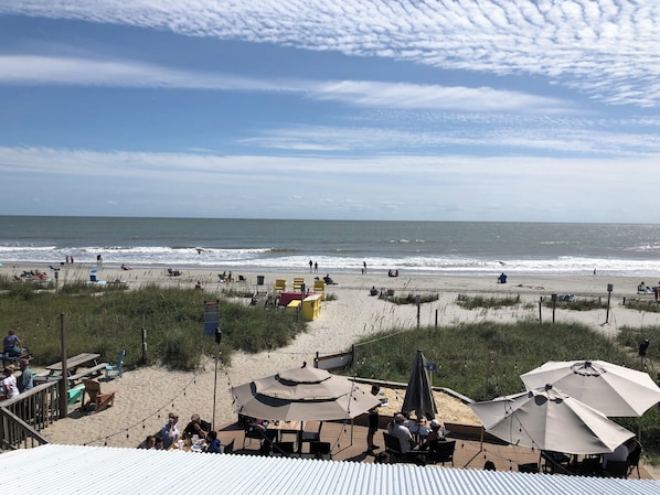 On the beach, sun-loungers, beach towels
