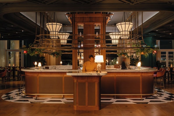 3 bars/lounges, poolside bar, beach bar