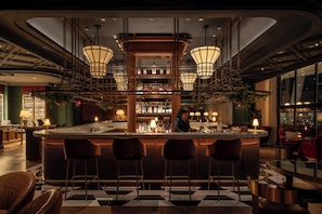3 bars/lounges, poolside bar, beach bar