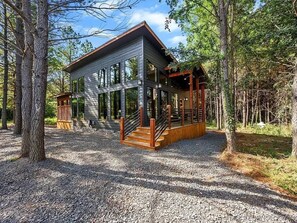 Arrive, pull in, and breathe—you’re here. The spacious circle driveway gives you plenty of room to pull through, maneuver, and park your trailer comfortably, so settling into your getaway is easy from the moment you arrive