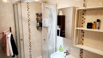 Eco-friendly toiletries, hair dryer, towels, soap