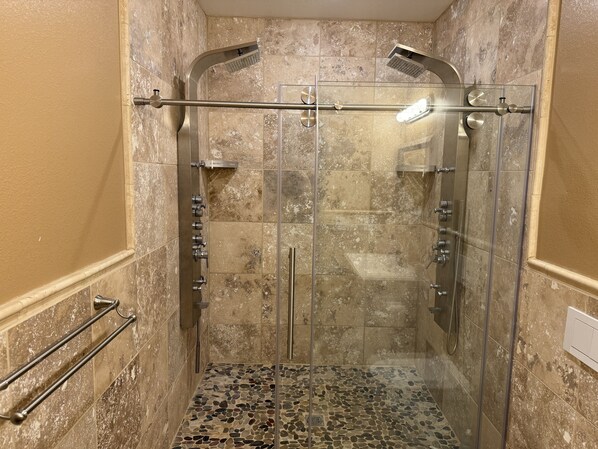 Shower, hair dryer, towels, soap