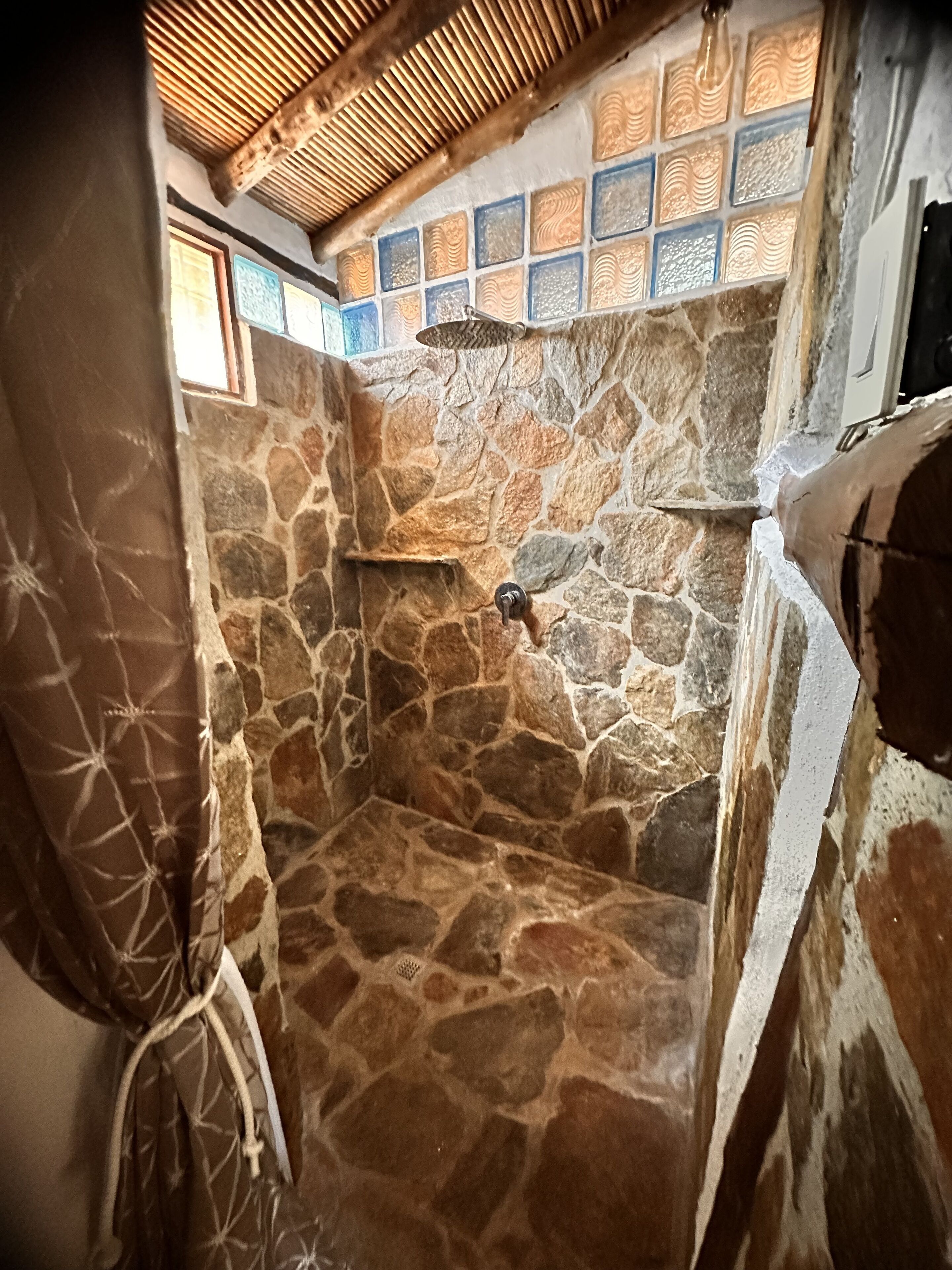 Shower, towels, soap, toilet paper