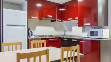 Fridge, microwave, coffee/tea maker, toaster