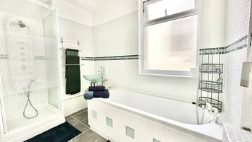 Hair dryer, towels, soap, shampoo
