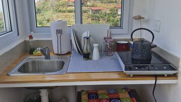 Fridge, microwave, stovetop, coffee/tea maker