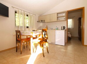 Fridge, stovetop, cookware/dishes/utensils