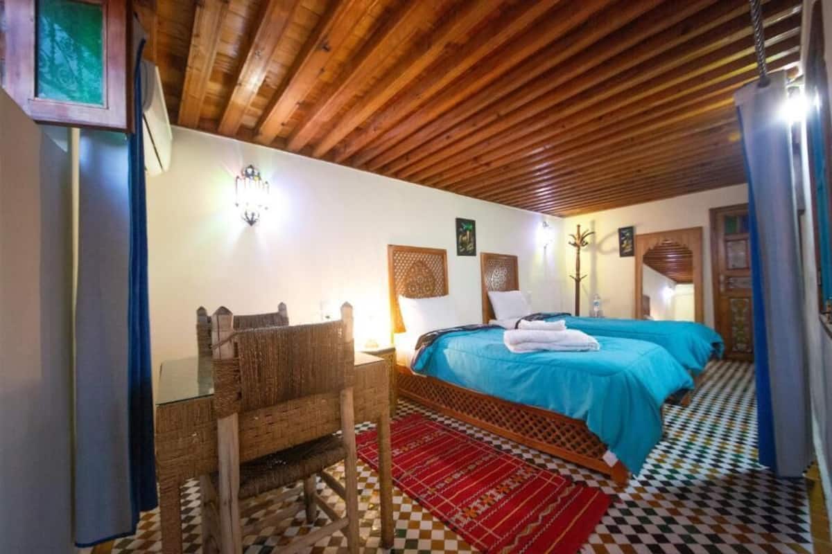 Desk, laptop workspace, free WiFi, bed sheets