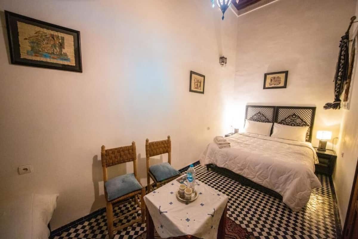 Desk, laptop workspace, free WiFi, bed sheets